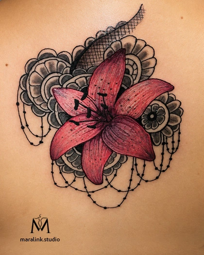 Floral lace back piece — body tattoo by Maral at Maralink Studio, Richmond Hill